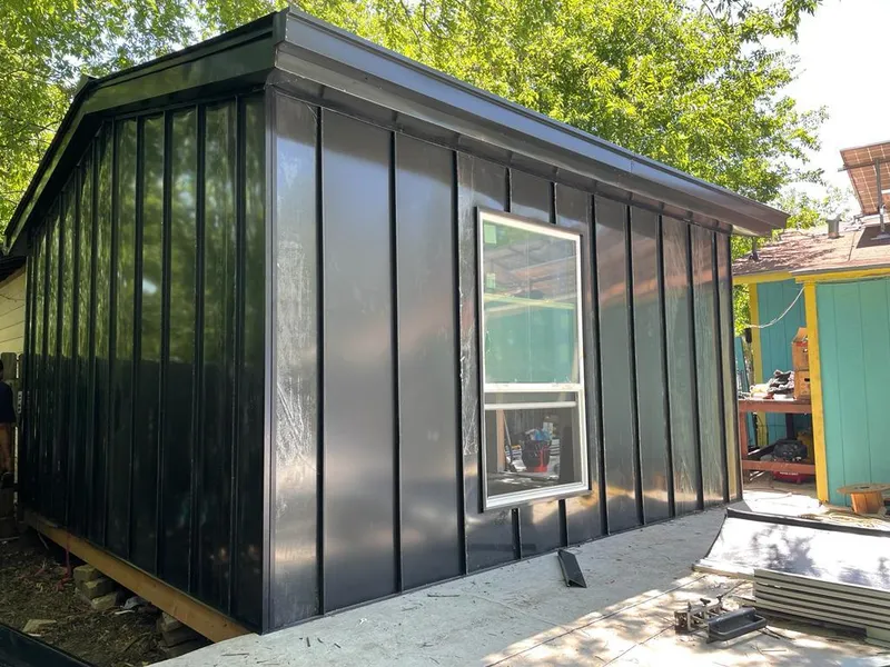 Black standing seam metal wall panels for Metal Roof Installation in Conyers